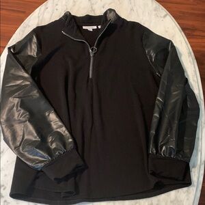 Chicos size 3 top with soft sweatshirt material and imitation leather sleeves.